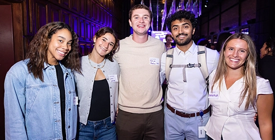 Alumni celebrating at New Chapter NU Neighbors event